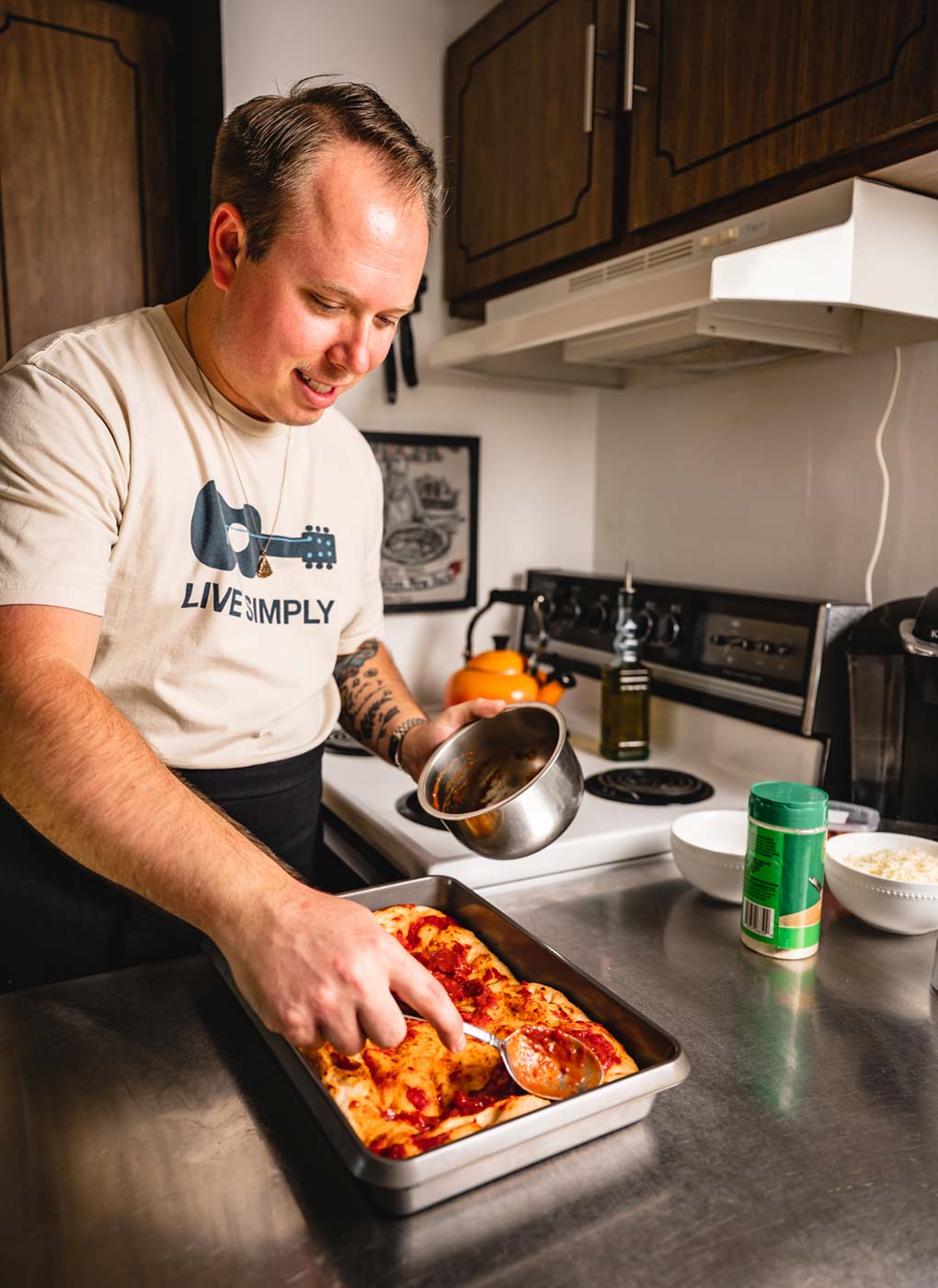 Spencer has been turning out pizzas one at a time from his home kitchen to meet the growing demand.