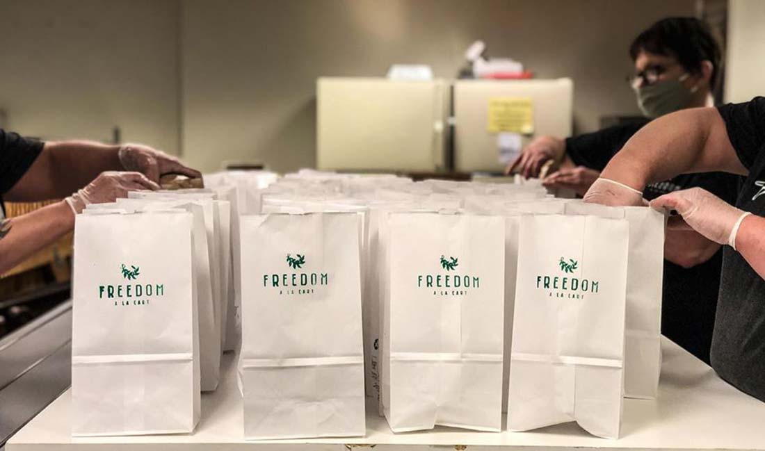 When the pandemic closed down catering, Freedom a la Cart began making sack lunches to feed survivors of human trafficking. Photo courtesy of Freedom a la Cart.