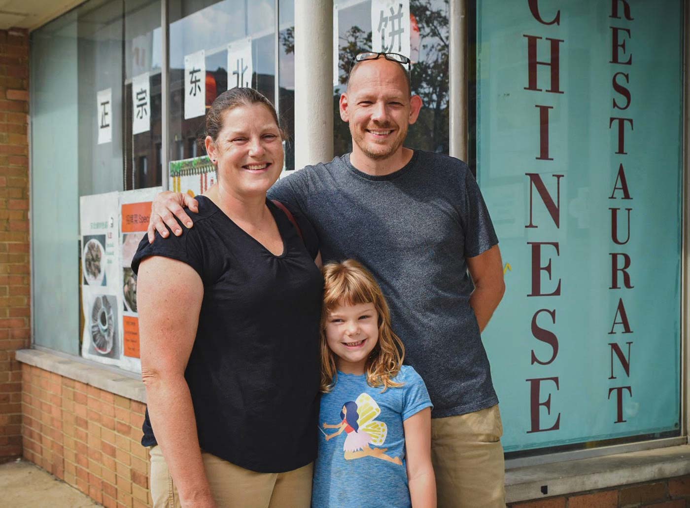 Bethia Woolf, Andy Dehus and their daughter, Zoe, visit NE Chinese Restaurant on North High Street, which is among the restaurants included in Trust Fall dinners.