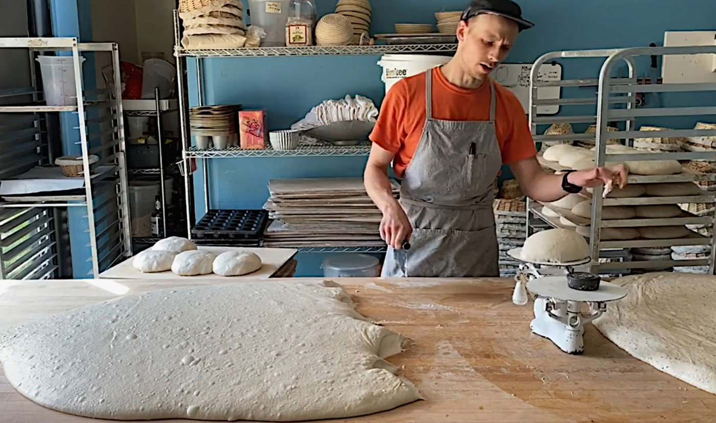 Dan Riesenberger demonstrates his break-making process in a scene from a video on his Dan the Baker Instagram account.