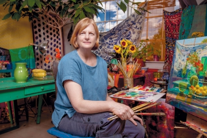 Painter Carol Stewart in her studio at Milo Arts Center in Columbu