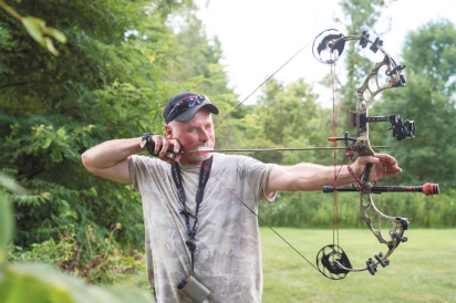 Local deer hunter Rich Malisiak practicing at the archery range in Delaware