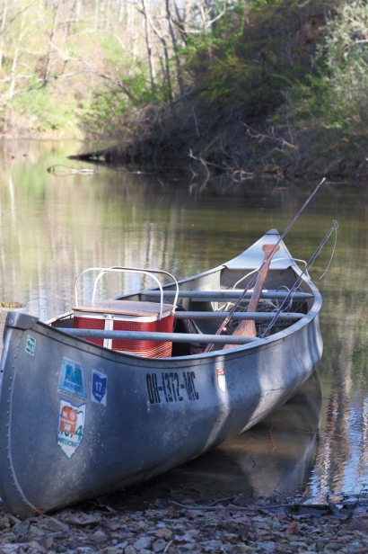 canoe on the edge of a lake