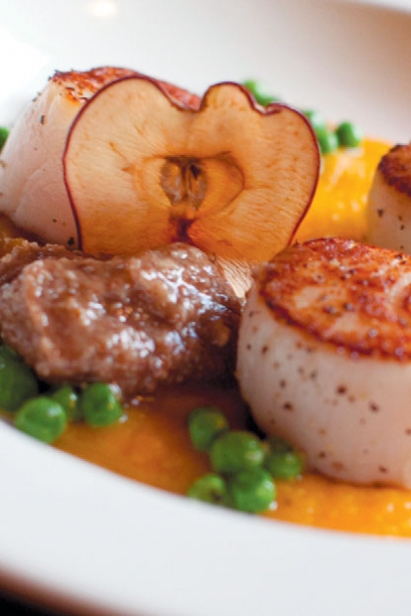 Pan Seared Scallops with Butternut Purée, Sweet Peas, Pecan Butter with an Apple Chip at Kindred Spirits restaurant at The Inn & Spa.